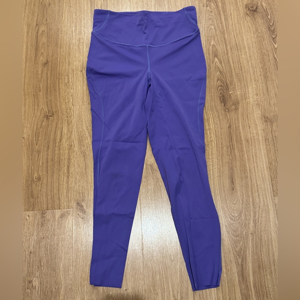 Lululemon Base Pace High Rise Tight 25” in indigo/purple color